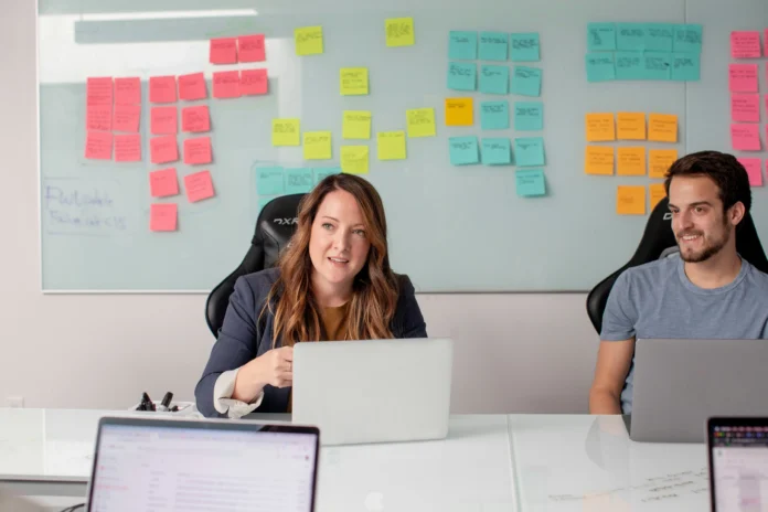 How Startups Can Effectively Use Their PR Budget for Better Results Startup team planning PR strategy to maximize limited PR budget for brand visibility